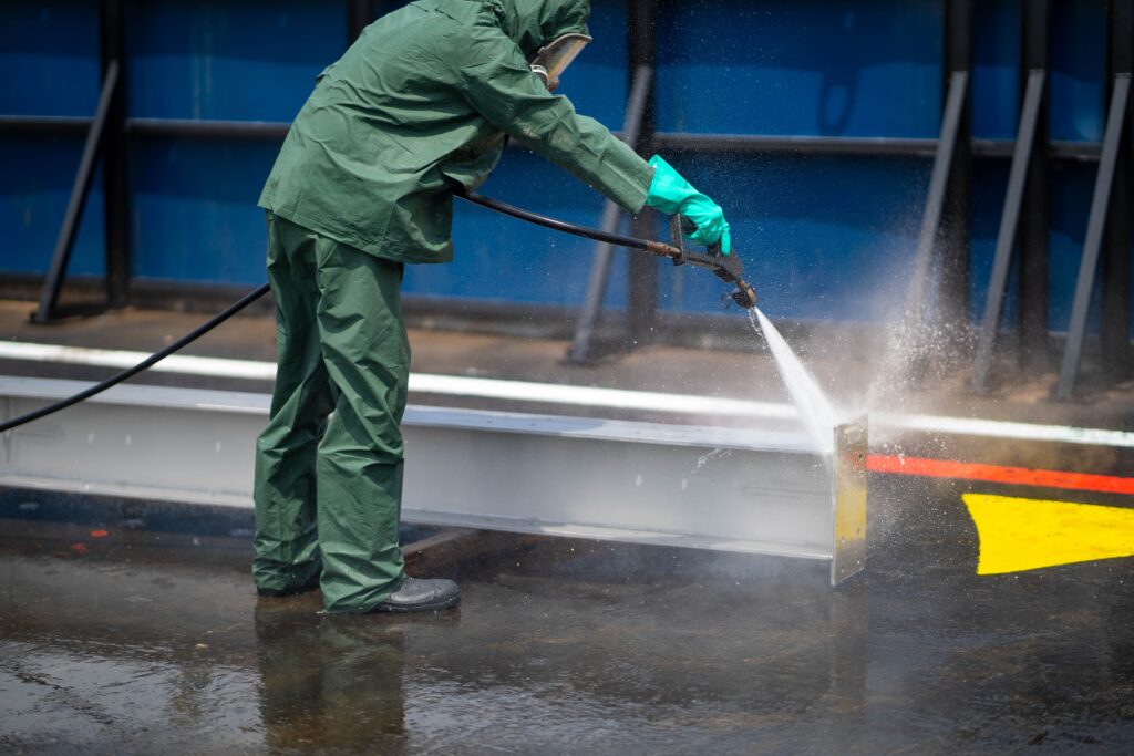 A,Worker,Cleaning,Metal,After,Metal,Treatment.